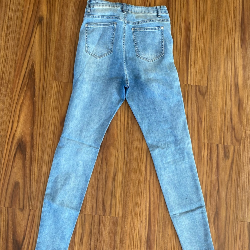 High waisted skinny jeans, fit like a size 4